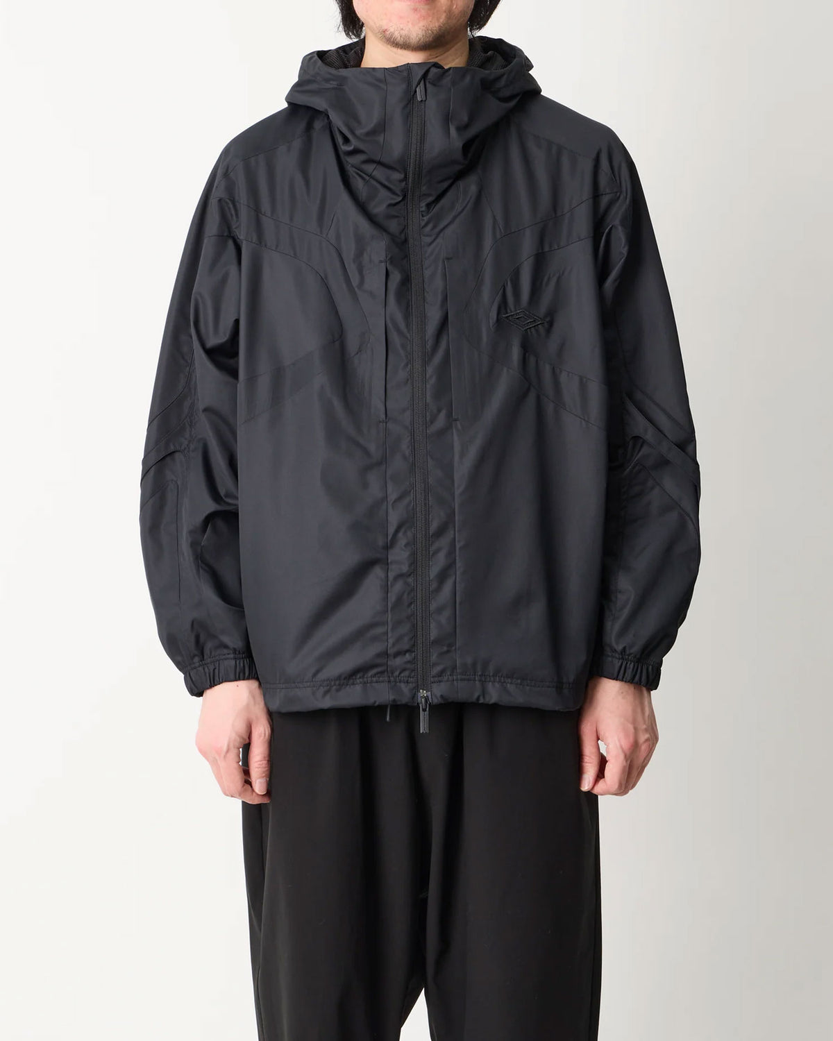 WM × UMBRO HOODED JACKET