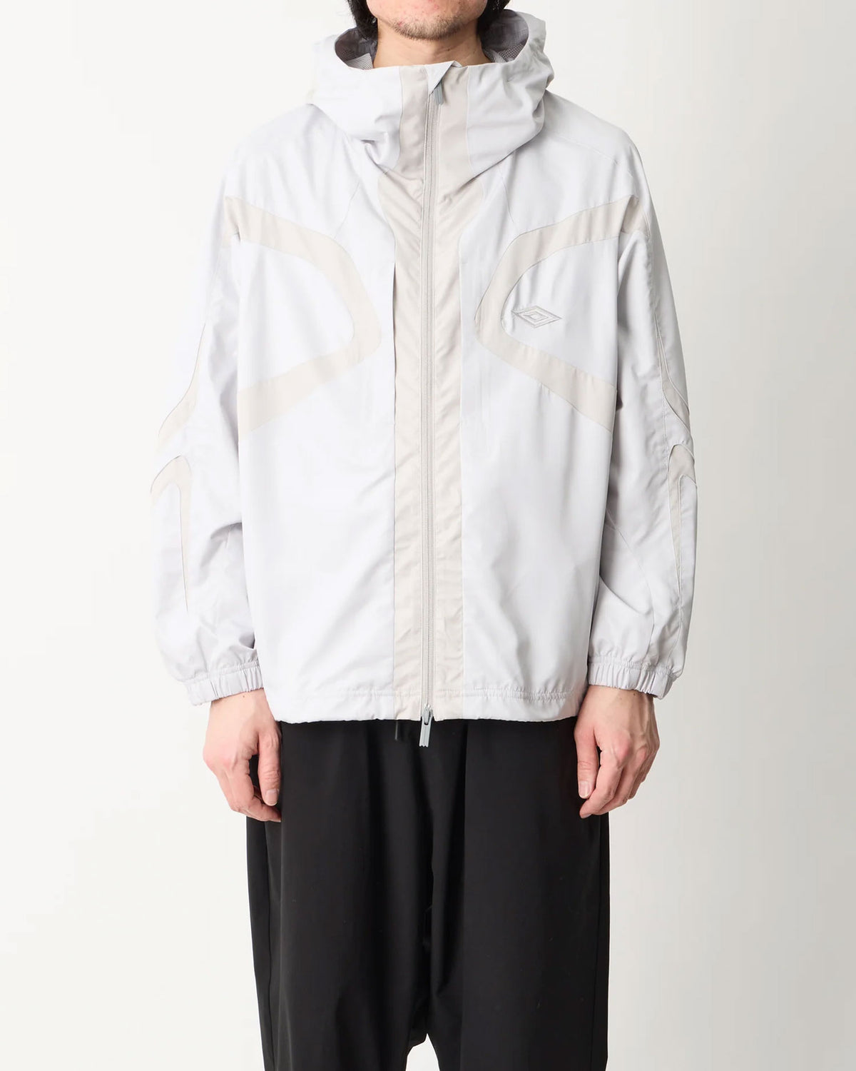 WM × UMBRO HOODED JACKET